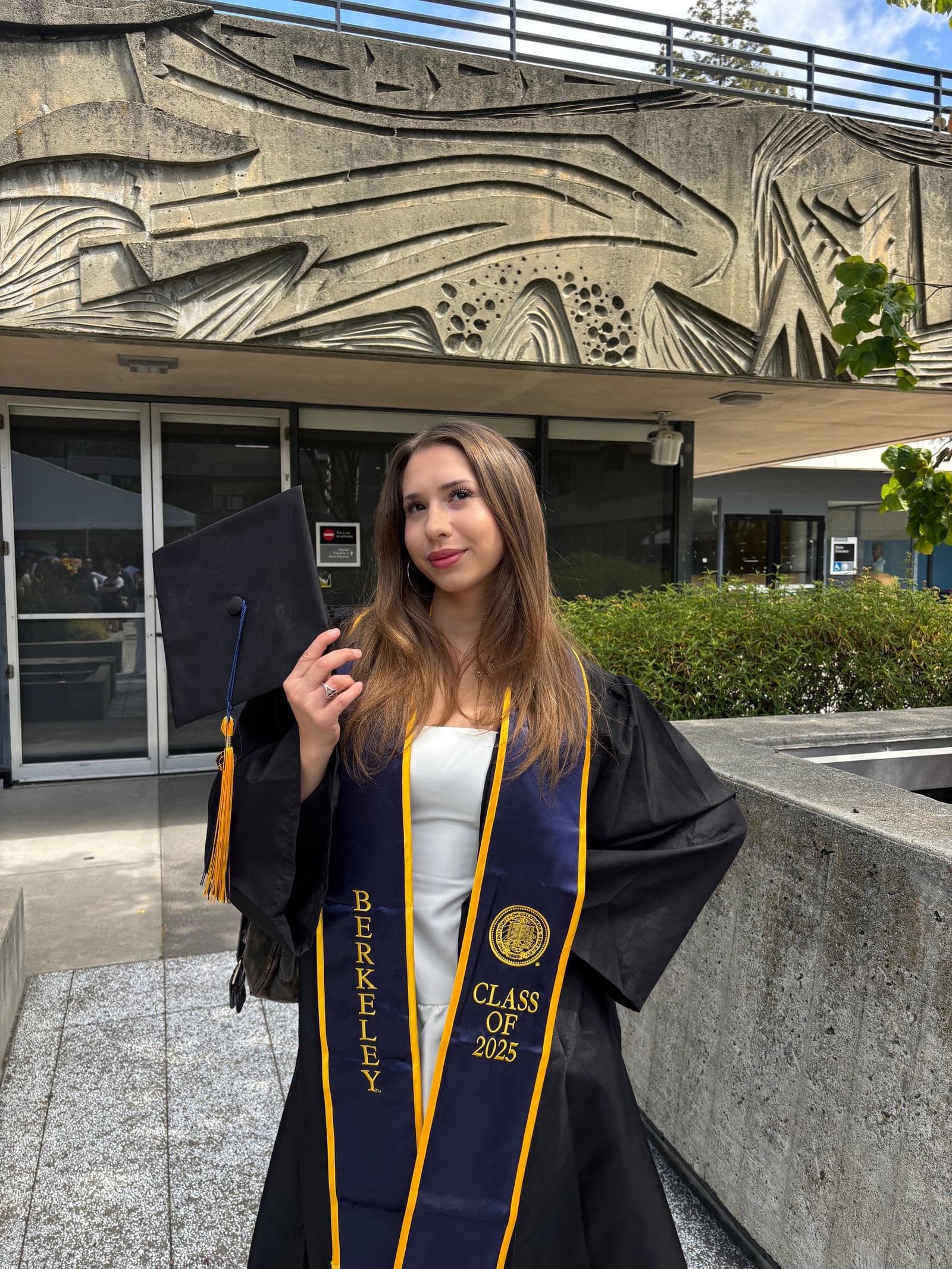 Brittany, Mentor For Change mentee alumna, in her UC Berkeley graduation gown