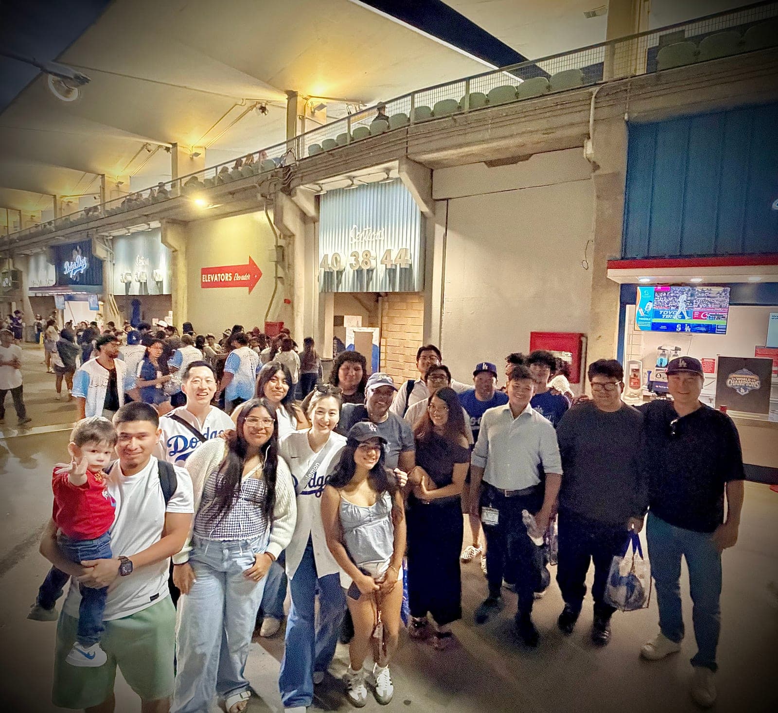 A large MFC group posing together at a Dodgers game