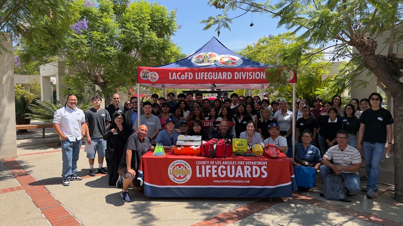 MFC youth and mentors at a community event with LA County Fire Lifeguards