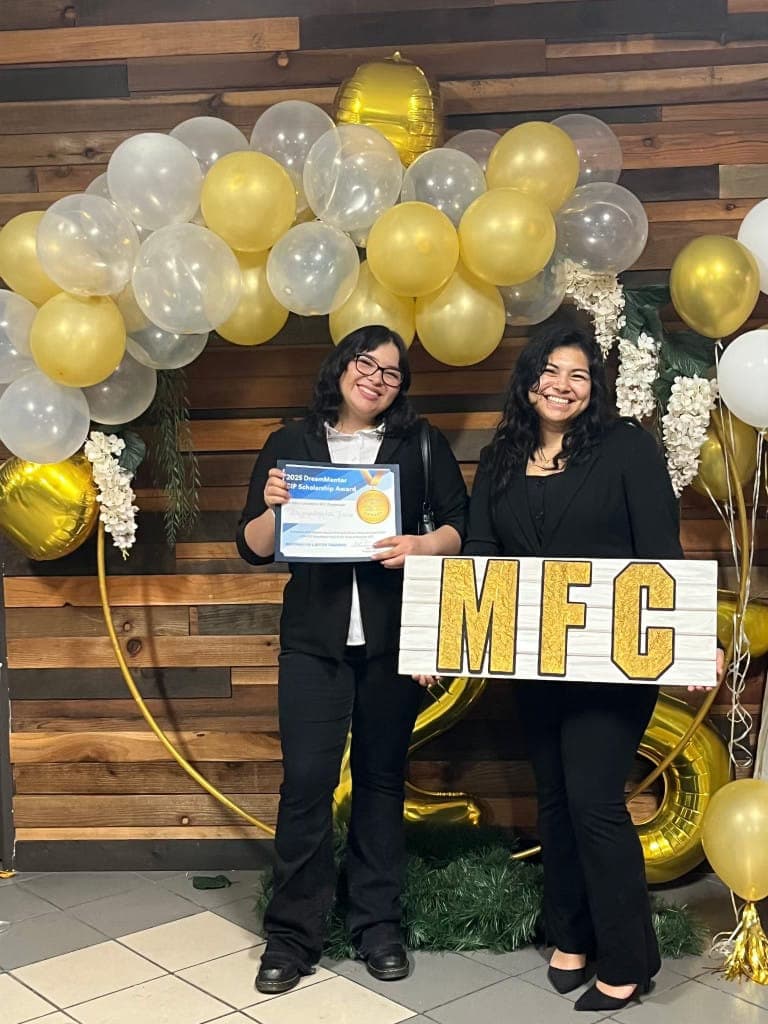 Two MFC youth celebrating at a recognition event