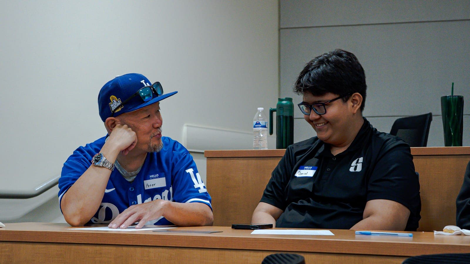 A DreamMentor mentor and mentee talking at a program session