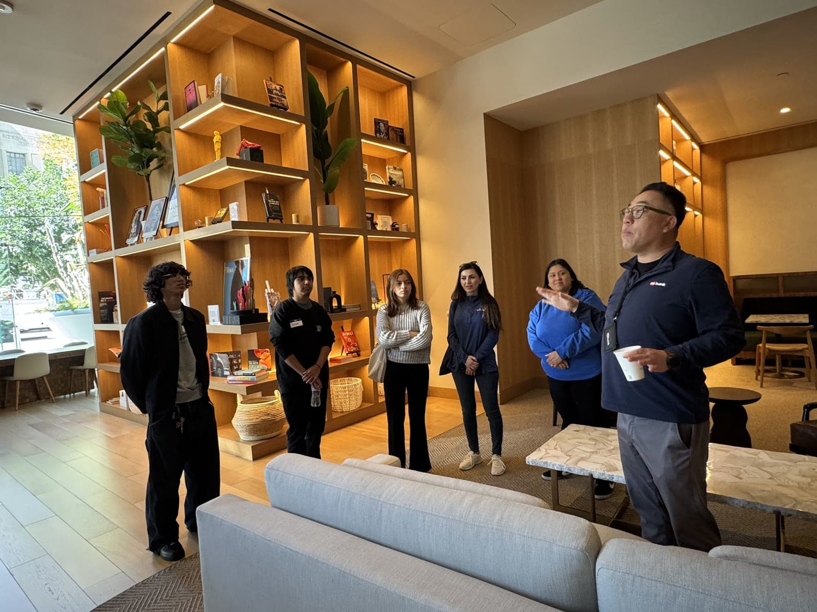 Youth Advisory Board members touring a partner workplace at U.S. Bank